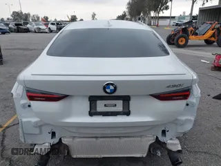 2022 BMW 4 Series 430i with VIN WBA53AP02NCK91287, listed as a IAAI auction lot 41448686 with 27,046 mi miles and . Bid and sale history available at carsss.com. Image 17.