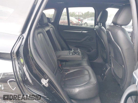 2017 BMW X1 sDrive28i with VIN WBXHU7C36HP924874, listed as a IAAI auction lot 41368396 with 113,443 mi miles. Bid and sale history available at carsss.com. Image 8.
