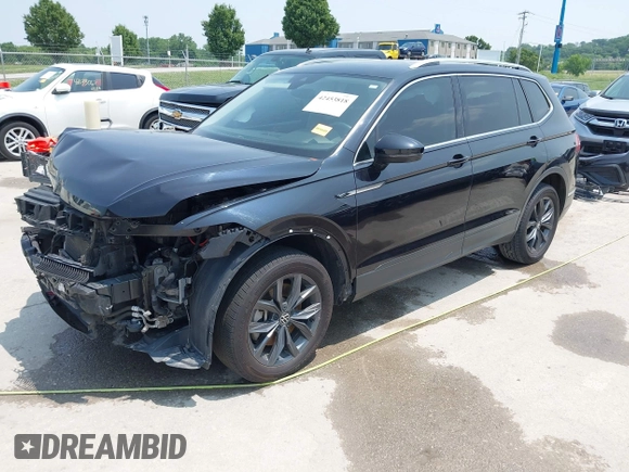 2023 Volkswagen Tiguan SE with VIN 3VVNB7AX5PM017938, listed as a IAAI auction lot 42453818 with 177,906 mi miles and . Bid and sale history available at DreamBid. Image 2.
