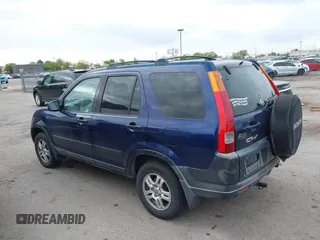 2003 Honda CR-V EX with VIN JHLRD78853C001990, listed as a IAAI auction lot 42151771 with 306,724 mi miles and . Bid and sale history available at carsss.com. Image 3.