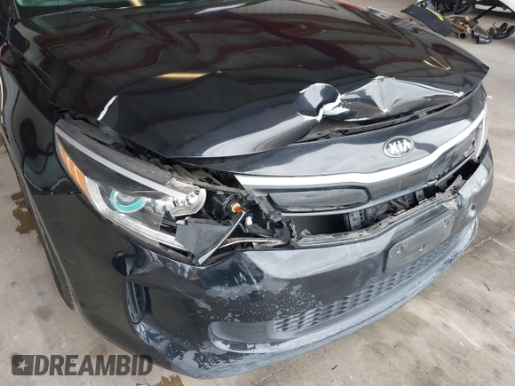 2017 Kia Optima EX with VIN KNAGU4LE5H5016627, listed as a IAAI auction lot 42055983 with 119,573 mi miles and . Bid and sale history available at DreamBid. Image 6.
