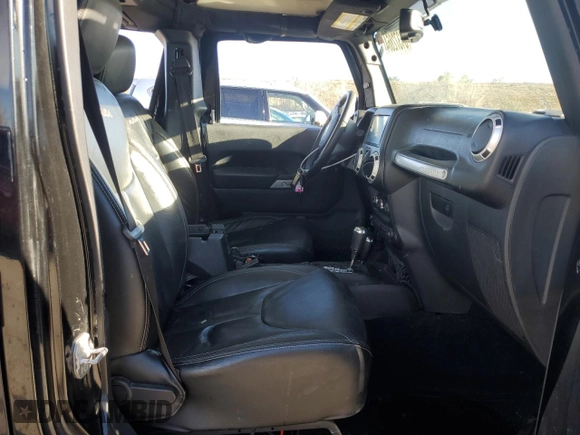 2016 Jeep Wrangler Unlimited 75th Anniversary with VIN 1C4BJWEG7GL113824, listed as a Copart auction lot 81372864 with 98,497 mi miles and Salvage title. Bid and sale history available at DreamBid. Image 7.