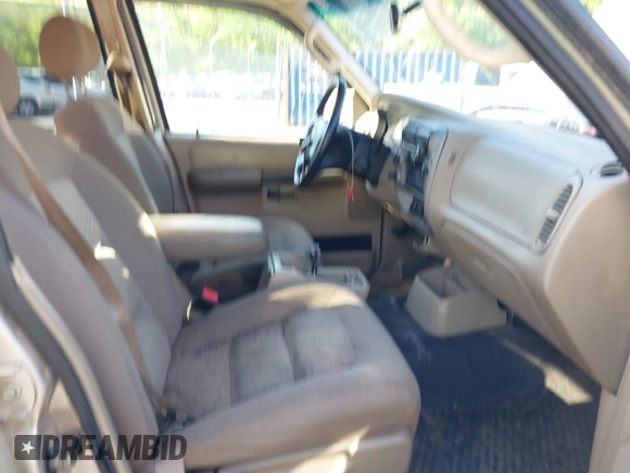 2004 Ford Explorer Sport Trac XLS z VIN 1FMZU77K84UA47217, wystawiony jako IAAI lot #42169359 z przebiegiem 169 053 mil mil oraz . Historia ofert i sprzedaży dostępna na DreamBid. Obrazek 5.