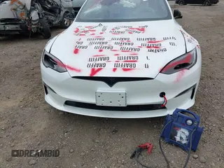 2023 Tesla Model S Plaid with VIN 5YJSA1E68PF507197, listed as a IAAI auction lot 42062258 with Not provided miles and . Bid and sale history available at DreamBid. Image 12.