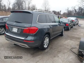 2015 Mercedes-Benz GL-Class GL 450 with VIN 4JGDF6EE7FA516507, listed as a IAAI auction lot 41543310 with 186,164 mi miles. Bid and sale history available at carsss.com. Image 4.