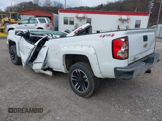 2014 Chevrolet Silverado 1500 LTZ with VIN 1GCVKSEC1EZ209992, listed as a IAAI auction lot 41848951 with 174,111 mi miles and . Bid and sale history available at DreamBid. Image 3.