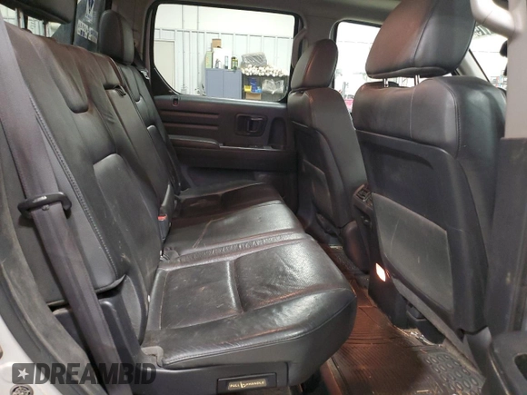 2013 Honda Ridgeline RTL z VIN 5FPYK1F54DB013144, wystawiony jako Copart lot #51323175 z przebiegiem 240 093 mil mil oraz Czysty tytuł • Clean title. Historia ofert i sprzedaży dostępna na DreamBid. Obrazek 10.