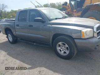 2006 Dodge Dakota SLT with VIN 1D7HE48N06S580705, listed as a IAAI auction lot 42120728 with 206,420 mi miles. Bid and sale history available at carsss.com. Image 1.