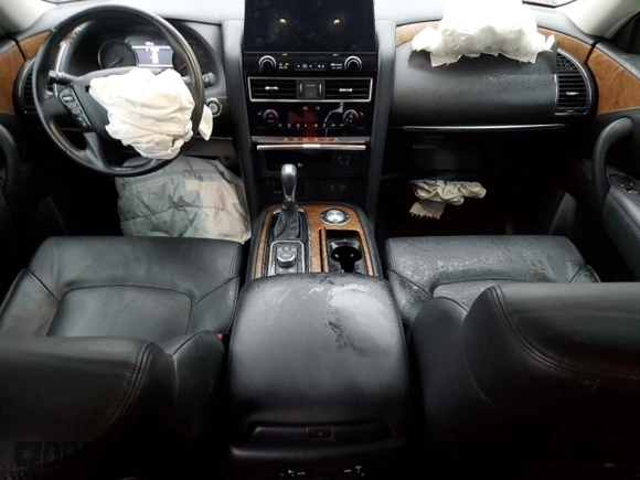 2021 Nissan Armada SL with VIN JN8AY2BC0M9147490, listed as a Copart auction lot 82825424 with 64,968 mi miles and Salvage Title. Bid and sale history available at carsss.com. Image 8.