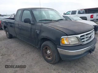 1999 Ford F-150 with VIN 1FTRX17W7XNC31381, listed as a IAAI auction lot 41734799 with 122,035 mi miles and . Bid and sale history available at DreamBid. Image 1.