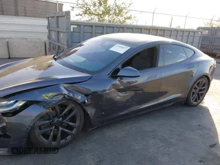 2021 Tesla Model S Long Range with VIN 5YJSA1E53MF436865, listed as a IAAI auction lot 41384837 with 20,829 mi miles and . Bid and sale history available at DreamBid. Image 6.