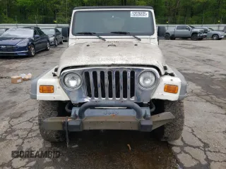 2005 Jeep Wrangler Sport z VIN 1J4FA49S55P334844, wystawiony jako Copart lot #52026835 z przebiegiem 209 216 mil mil oraz Czysty tytuł • Clean title. Historia ofert i sprzedaży dostępna na DreamBid. Obrazek 5.