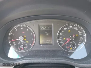 2015 Volkswagen Passat 1.8T S with VIN 1VWAT7A30FC020122, listed as a IAAI auction lot 41449481 with 129,650 mi miles. Bid and sale history available at carsss.com. Image 7.