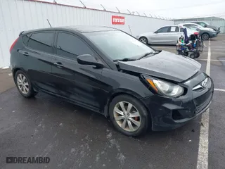 2012 Hyundai Accent SE with VIN KMHCU5AE1CU035390, listed as a IAAI auction lot 41765900 with 127,685 mi miles. Bid and sale history available at carsss.com. Image 1.