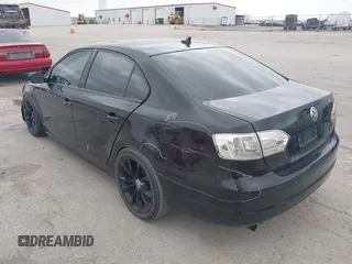 2014 Volkswagen Jetta SE z VIN 3VWD17AJ7EM388375, wystawiony jako IAAI lot #42144779 z przebiegiem 104 801 mil mil oraz . Historia ofert i sprzedaży dostępna na DreamBid. Obrazek 6.