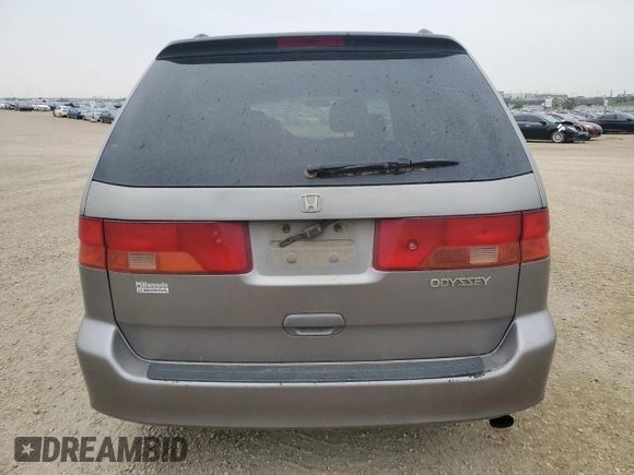 2000 Honda Odyssey EX z VIN 2HKRL186XYH010384, wystawiony jako Copart lot #60871845 z przebiegiem 423 167 mil mil oraz Czysty tytuł • Clean title. Historia ofert i sprzedaży dostępna na DreamBid. Obrazek 6.