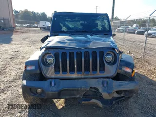 2019 Jeep Wrangler Unlimited Sport S with VIN 1C4HJXDGXKW500313, listed as a IAAI auction lot 41022680 with 82,864 mi miles and . Bid and sale history available at DreamBid. Image 12.