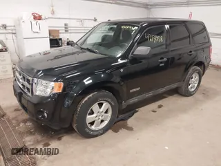 2008 Ford Escape XLT with VIN 1FMCU93108KA04863, listed as a IAAI auction lot 42131438 with 126,439 mi miles. Bid and sale history available at carsss.com. Image 2.