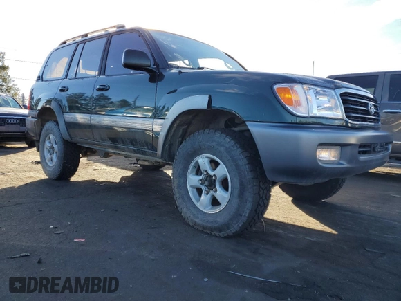 1999 Toyota Land Cruiser with VIN JT3HT05J5X0031805, listed as a Copart auction lot 87014384 with 233,248 mi miles and Clean Title. Bid and sale history available at carsss.com. Image 4.