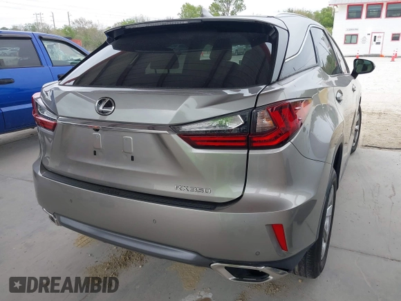 2018 Lexus RX 350 z VIN 2T2BZMCA3JC151296, wystawiony jako IAAI lot #41331203 z przebiegiem 73 051 mil mil oraz . Historia ofert i sprzedaży dostępna na DreamBid. Obrazek 4.