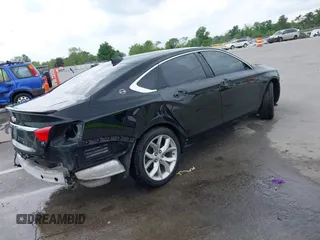 2016 Chevrolet Impala LT z VIN 2G1115S38G9142594, wystawiony jako IAAI lot #42346375 z przebiegiem 256 589 mil mil oraz . Historia ofert i sprzedaży dostępna na DreamBid. Obrazek 4.