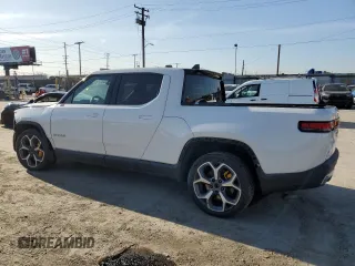 2022 Rivian R1T Adventure z VIN 7FCTGAAA9NN014280, wystawiony jako Copart lot #49723355 z przebiegiem 28 601 mil mil oraz Szkody całkowita. Historia ofert i sprzedaży dostępna na DreamBid. Obrazek 2.