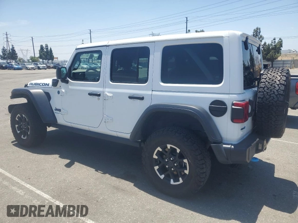 2024 Jeep Wrangler Rubicon X с VIN 1C4RJXR67RW242301, выставлен на аукционе Copart как лот 61178995 с пробегом 36 998 миль миль и Чистый • Clean title. История ставок и продаж доступна на DreamBid. Изображение 2.