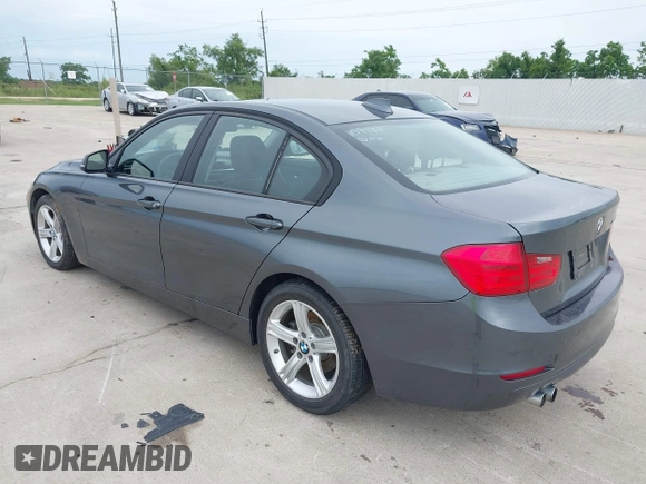 2014 BMW 3 Series 328i with VIN WBA3C1C55EK109175, listed as a IAAI auction lot 42463051 with 153,244 mi miles and . Bid and sale history available at DreamBid. Image 3.