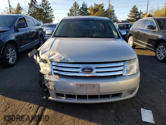2009 Ford Taurus Limited with VIN 1FAHP25W89G101188, listed as a Copart auction lot 77220984 with 149,142 mi miles and Salvage Title. Bid and sale history available at carsss.com. Image 5.