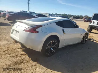 2018 Nissan 370Z Coupe NISMO with VIN JN1AZ4EH5JM572579, listed as a Copart auction lot 82122064 with 125,587 mi miles and Salvage Title. Bid and sale history available at carsss.com. Image 3.