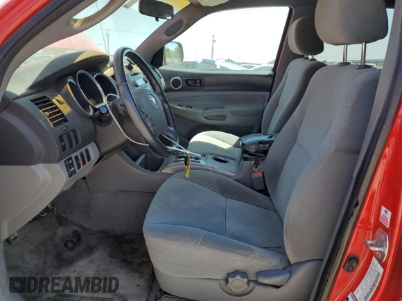 2008 Toyota Tacoma PreRunner with VIN 3TMKU72NX8M015810, listed as a Copart auction lot 56237155 with 165,871 mi miles and Salvage title. Bid and sale history available at DreamBid. Image 7.