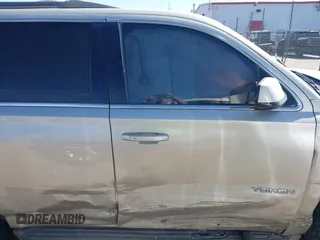 2015 GMC Yukon SLT with VIN 1GKS1BKC1FR145694, listed as a IAAI auction lot 41851644 with 162,592 mi miles. Bid and sale history available at carsss.com. Image 13.