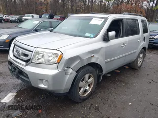 2009 Honda Pilot EX-L with VIN 5FNYF486X9B028209, listed as a IAAI auction lot 41959805 with 264,728 mi miles and . Bid and sale history available at carsss.com. Image 2.