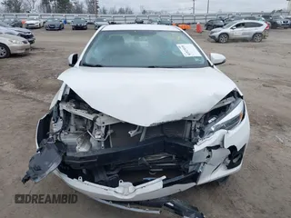 2016 Toyota Corolla L with VIN 2T1BURHE5GC644191, listed as a IAAI auction lot 41523018 with 153,392 mi miles and . Bid and sale history available at DreamBid. Image 13.
