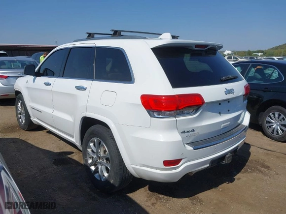 2014 Jeep Grand Cherokee Overland with VIN 1C4RJFCTXEC128443, listed as a IAAI auction lot 40512681 with 126,379 mi miles. Bid and sale history available at carsss.com. Image 3.