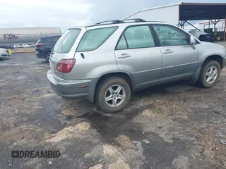 2000 Lexus RX 300 z VIN JT6GF10U3Y0060413, wystawiony jako IAAI lot #42108695 z przebiegiem 174 769 mil mil oraz . Historia ofert i sprzedaży dostępna na DreamBid. Obrazek 4.