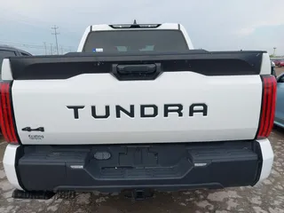 2023 Toyota Tundra SR5 with VIN 5TFLA5DB0PX077679, listed as a IAAI auction lot 42354545 with 31,838 mi miles and . Bid and sale history available at DreamBid. Image 16.