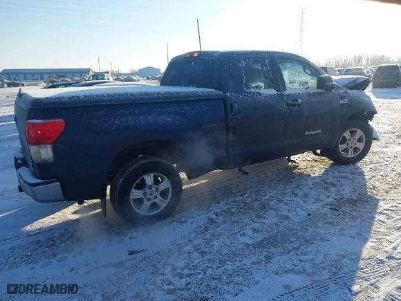 2010 Toyota Tundra 4WD Truck with VIN 5TFUW5F11AX120069, listed as a IAAI auction lot 41378490 with 413,655 mi miles. Bid and sale history available at carsss.com. Image 4.