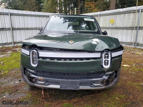 2023 Rivian R1S Adventure with VIN 7PDSGABA4PN014067, listed as a Copart auction lot 77630794 with 0 mi miles and Salvage Title. Bid and sale history available at carsss.com. Image 5.
