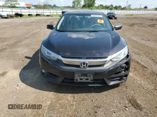 2016 Honda Civic EX-L z VIN 19XFC1F70GE002599, wystawiony jako Copart lot #60424185 z przebiegiem 113 707 mil mil oraz Szkoda całkowita • Salvage title. Historia ofert i sprzedaży dostępna na DreamBid. Obrazek 5.