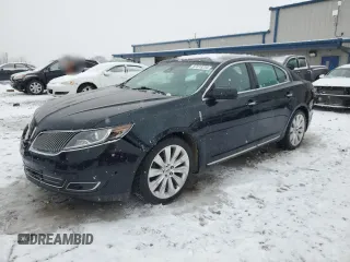 2014 Lincoln MKS EcoBoost z VIN 1LNHL9FT6EG608602, wystawiony jako Copart lot #87018254 z przebiegiem 124 329 mil mil oraz Czysty tytuł • Clean title. Historia ofert i sprzedaży dostępna na DreamBid. Obrazek 1.