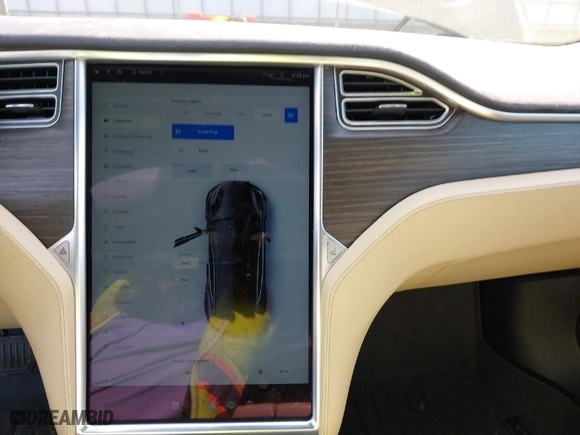 2015 Tesla Model S 85 kWh Battery with VIN 5YJSA1S11FFP79033, listed as a IAAI auction lot 41924740 with NaN miles. Bid and sale history available at carsss.com. Image 19.