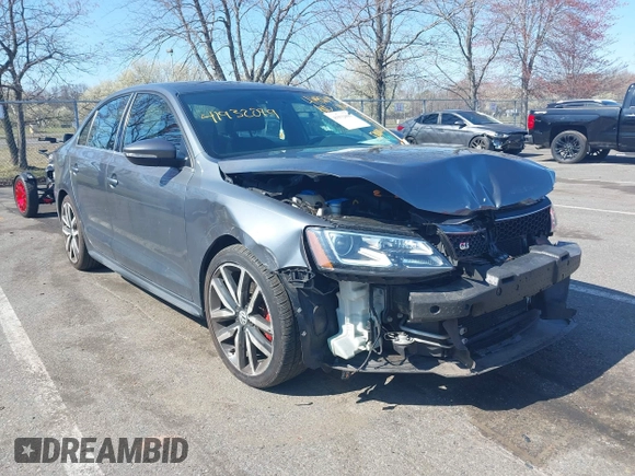 2014 Volkswagen Jetta GLI z VIN 3VW4T7AJ6EM360187, wystawiony jako IAAI lot #41932099 z przebiegiem 71 647 mil mil oraz . Historia ofert i sprzedaży dostępna na DreamBid. Obrazek 1.