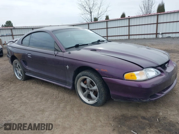 1996 Ford Mustang with VIN 1FALP404XTF174880, listed as a IAAI auction lot 41774122 with 285,302 mi miles. Bid and sale history available at carsss.com. Image 1.