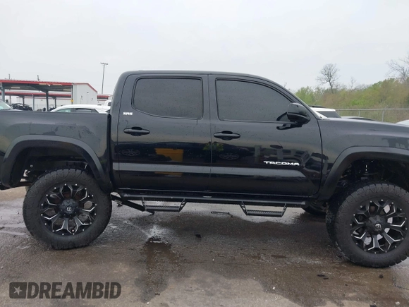 2017 Toyota Tacoma SR5 with VIN 5TFCZ5AN6HX076769, listed as a IAAI auction lot 41889869 with 208,894 mi miles. Bid and sale history available at carsss.com. Image 13.