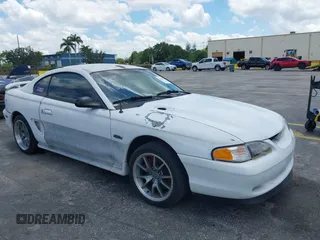 1996 Ford Mustang GT z VIN 1FALP42X5TF155418, wystawiony jako IAAI lot #42254706 z przebiegiem 143 046 mil mil oraz . Historia ofert i sprzedaży dostępna na DreamBid. Obrazek 1.