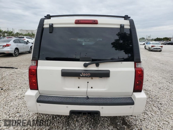 2006 Jeep Commander with VIN 1J8HH48N06C352871, listed as a Copart auction lot 87740115 with 163,703 mi miles and Salvage Title. Bid and sale history available at carsss.com. Image 6.
