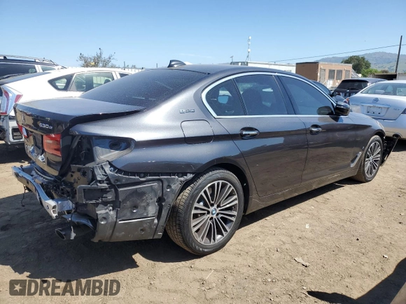 2018 BMW 5 Series 530e with VIN WBAJA9C52JB249402, listed as a Copart auction lot 55093055 with 117,033 mi miles and Salvage title. Bid and sale history available at DreamBid. Image 3.