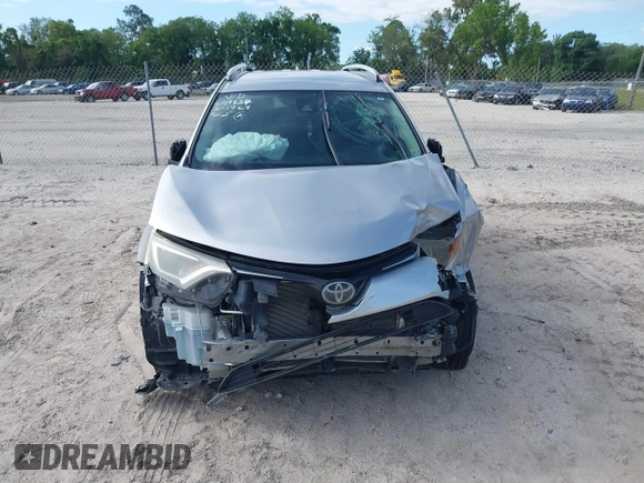 2017 Toyota RAV4 LE with VIN 2T3ZFREV2HW324895, listed as a IAAI auction lot 39150601 with 111,676 mi miles and . Bid and sale history available at carsss.com. Image 12.