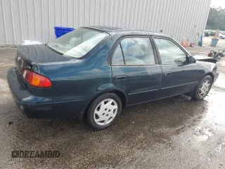 1999 Toyota Corolla VE с VIN 2T1BR18E7XC225469, выставлен на аукционе Copart как лот 59929415 с пробегом 222 746 миль миль и Списание • Salvage title. История ставок и продаж доступна на DreamBid. Изображение 3.